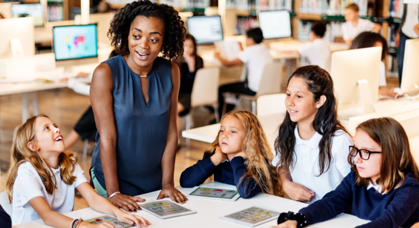 Kids on classroom with their private tutor